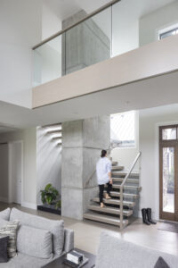 Concrete column and floating staircase