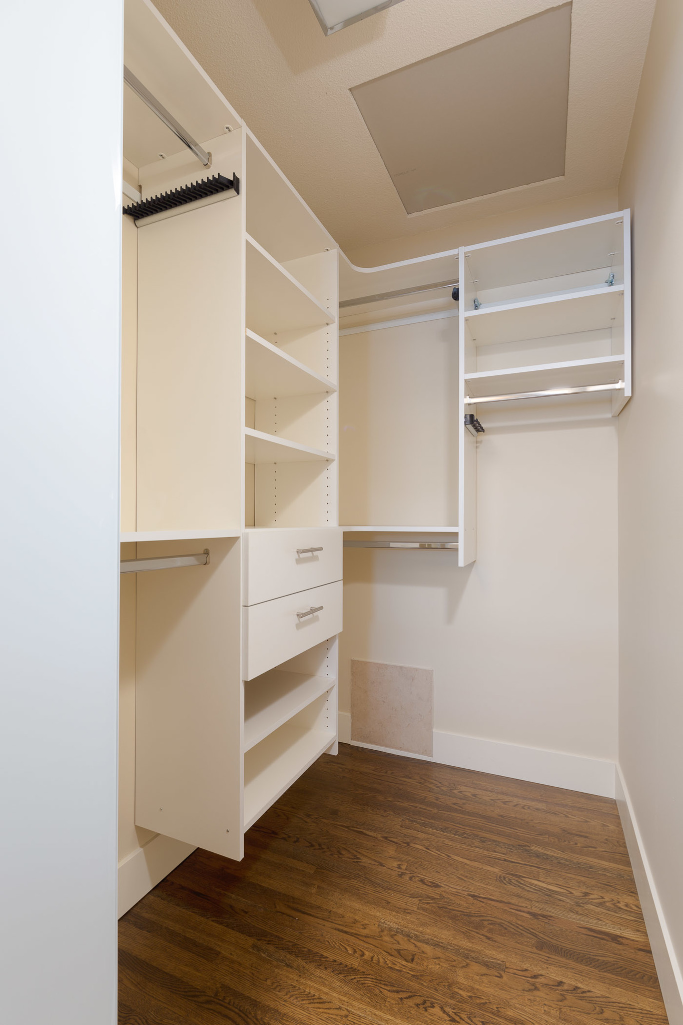 closet with built in shelves and organizing units