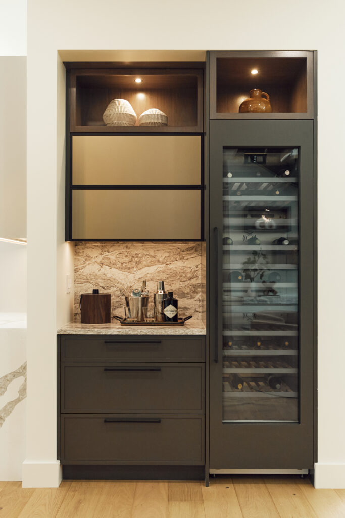 dry bar design with a tall built-in fridge in a custom home built by Stacy Eakman