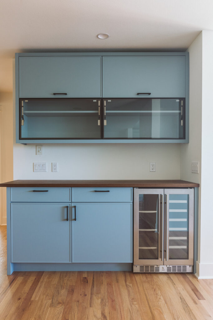 a small modern dry bar in a satin finish in custom home designed and built by Stacy Eakman | Alair Homes Kirkland 