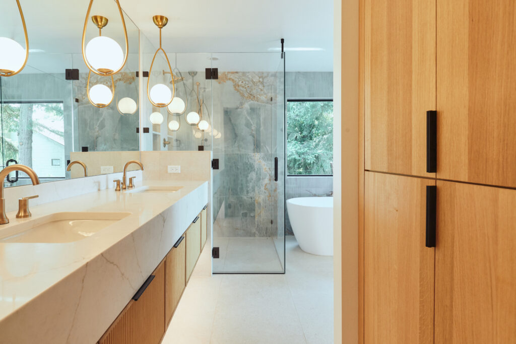 water Drop Milky White Ball bathroom vanity lighting in a custom bathroom in Mercer Island | Stacy Eakman Alair Homes Kirkland