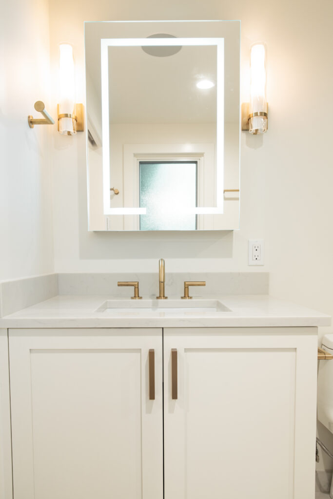 Modern Cylindrical Tube Sconce is a great bathroom vanity lighting option | Mercer Island | custom home by Alair Homes Kirkland | Stacy Eakman 