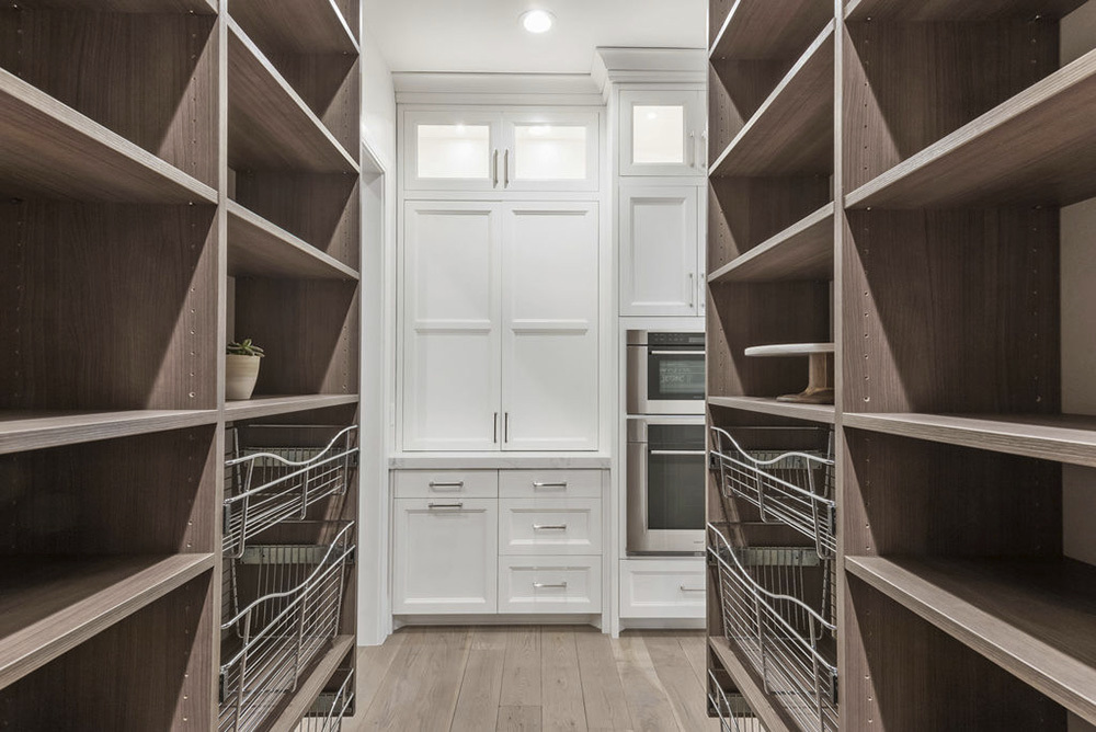 collingwood closet with built in shelving and wire baskets