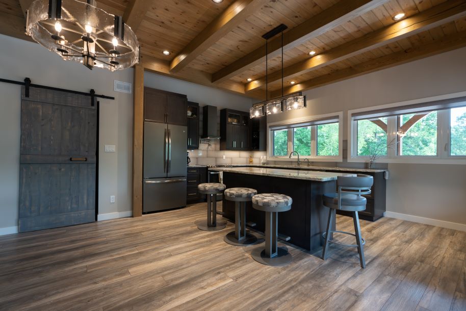 Kitchen with slate appliances and exposed beams