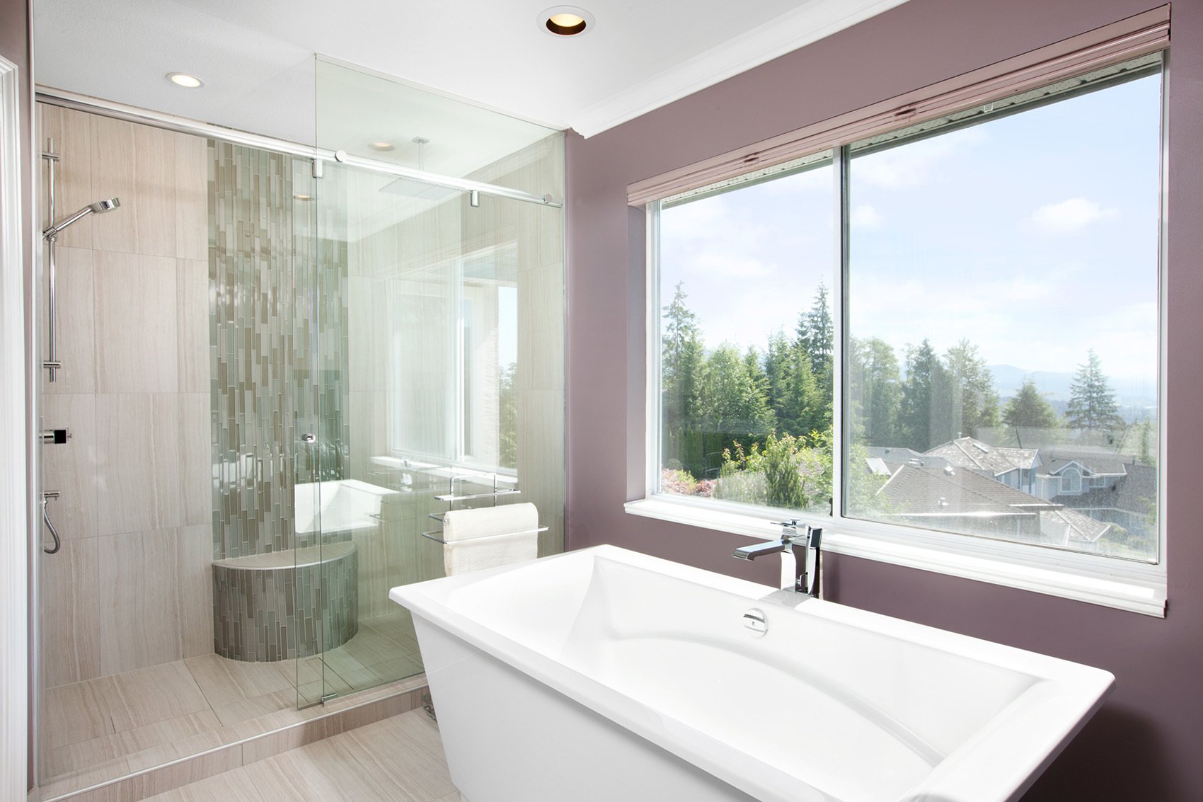 Destination bath tub in luxurious custom spa bathroom