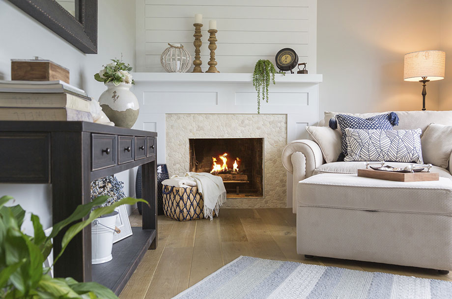 custom living room with extra plants and blankets around the room