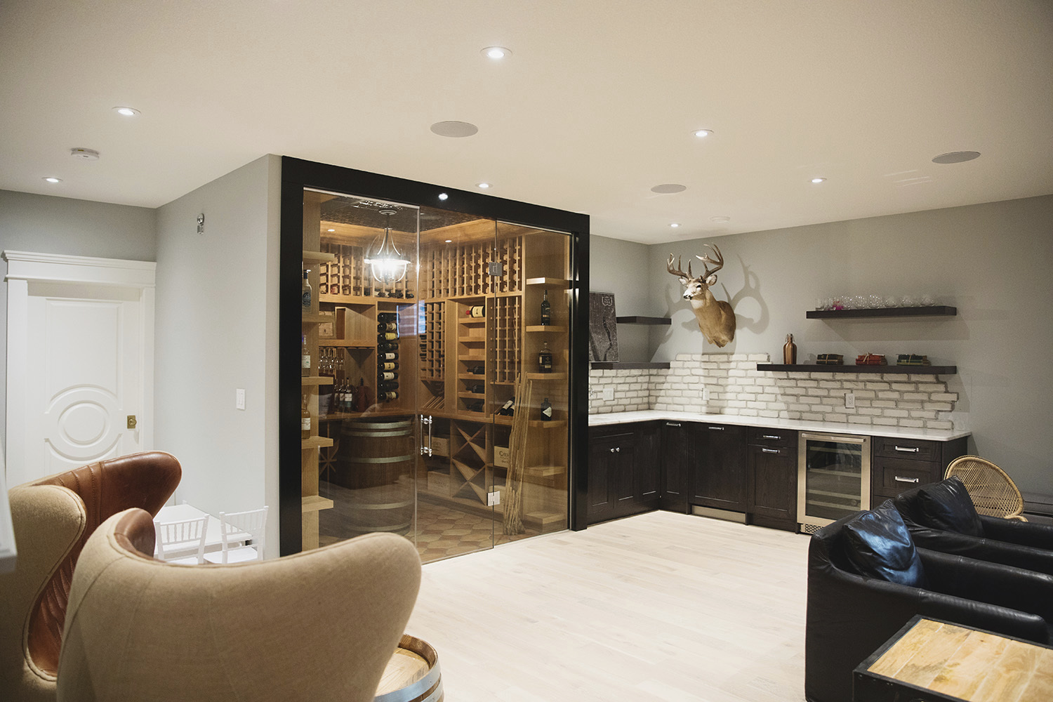 custom wine cellar built in modern sitting area