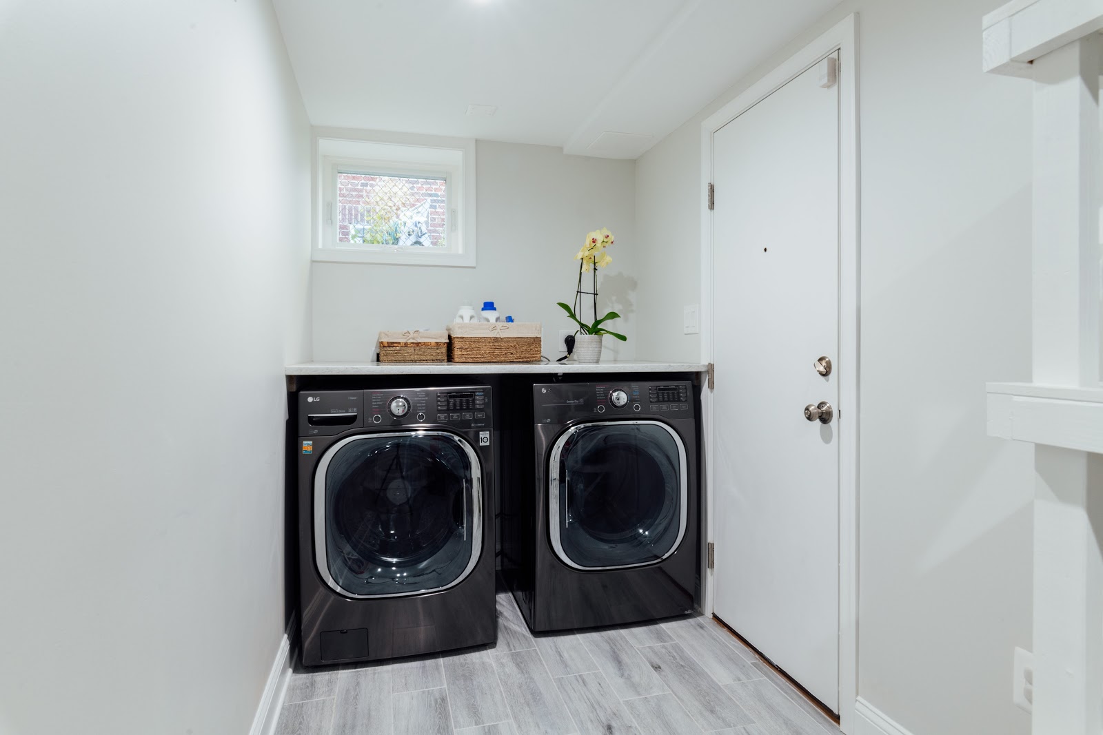 side-by-side laundry machines in the new laundry room
