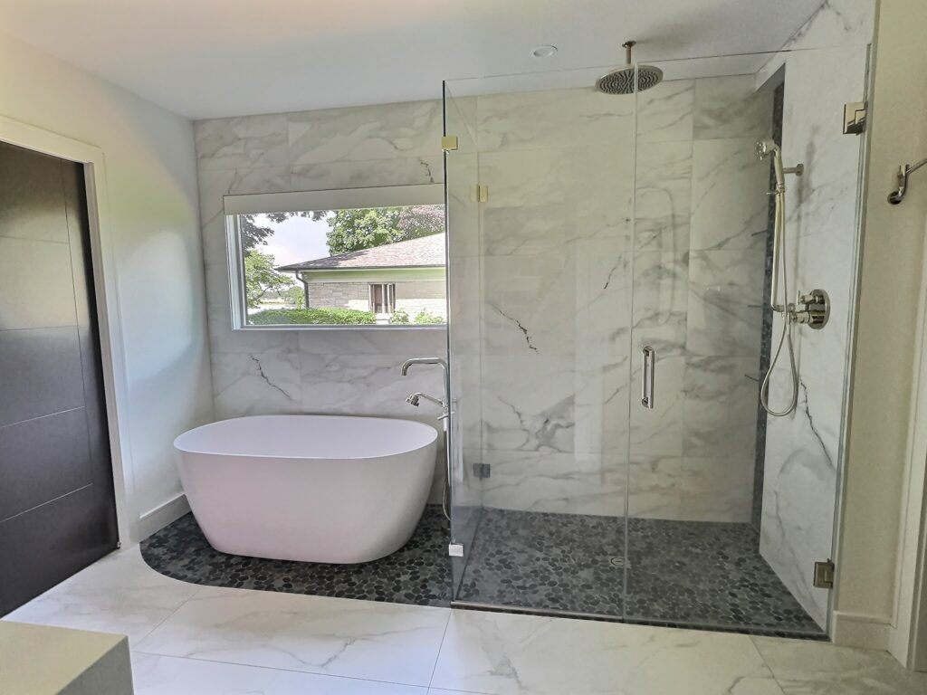 Spa-inspired modern bathroom with freestanding tub and walk-in shower