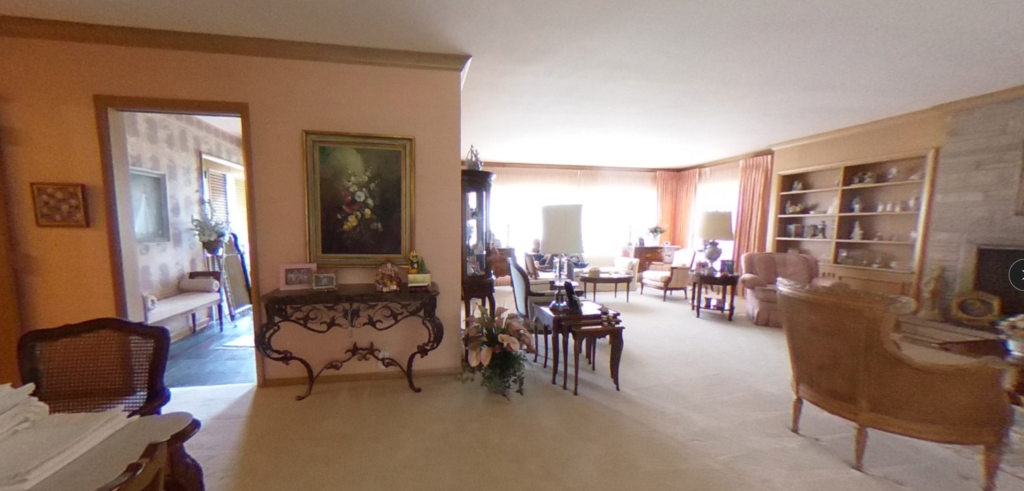 Traditional living room with vintage furnishings before renovation