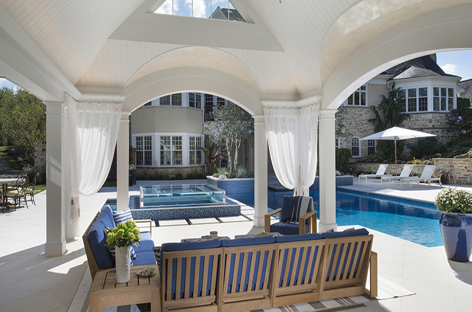 white terrace with wooden chairs