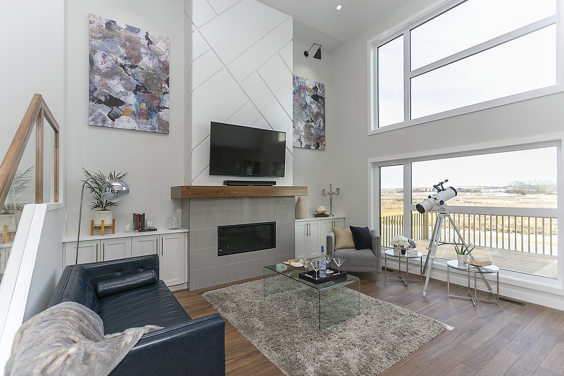 Custom living room with marble fireplace with geometric pattern 